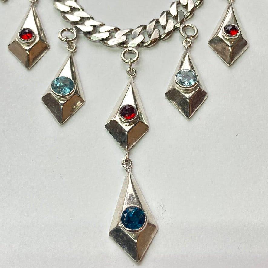 Dali North - Sterling with Topaz and Garnet